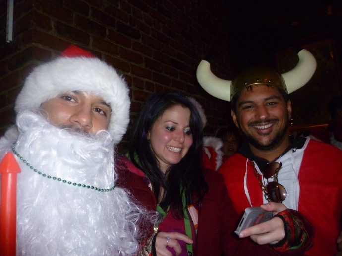 Some of the Santaconners who ended up at karaoke.  Is that a Viking Santa on the right?