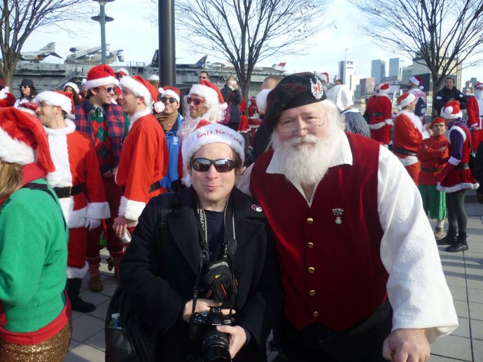 Here I am yesterday at Santacon 2012. The guy standing next to me looked the most authentic of any of the thousands of Santas in attendance, even though he wasn't actually wearing a traditional Santa suit.