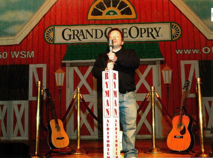 Me grabbing the mic on the Ryman Auditorium stage.
