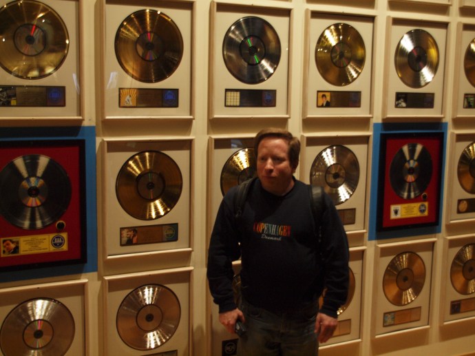 Me in front of some gold records in the Country Music Hall of Fame and Museum.