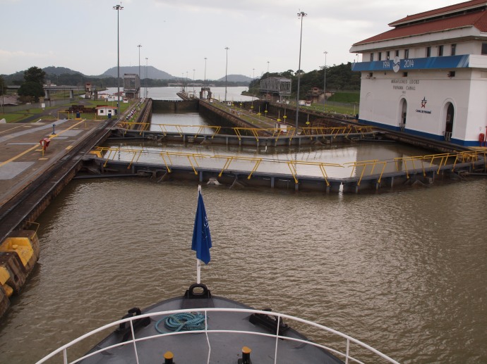 The view from a boat approaching one of the locks of the Panama Canal.