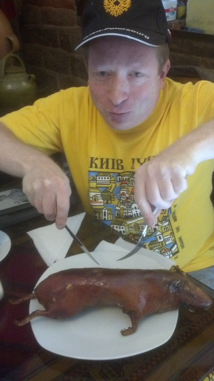 Here I am, about to dig in to a nice, savory rodent in a Cusco restaurant.