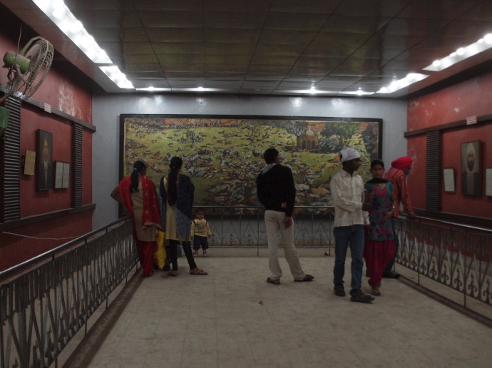 A small museum on the site provides information about the massacre. On the far wall seen here is a mural depicting the massacre.