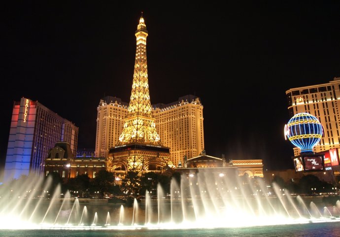 The Eiffel looms over the Paris Hotel, as seen from behind the fountains of the Bellagio across the street. This photo was taken during my very first visit to Las Vegas, in November 2008.