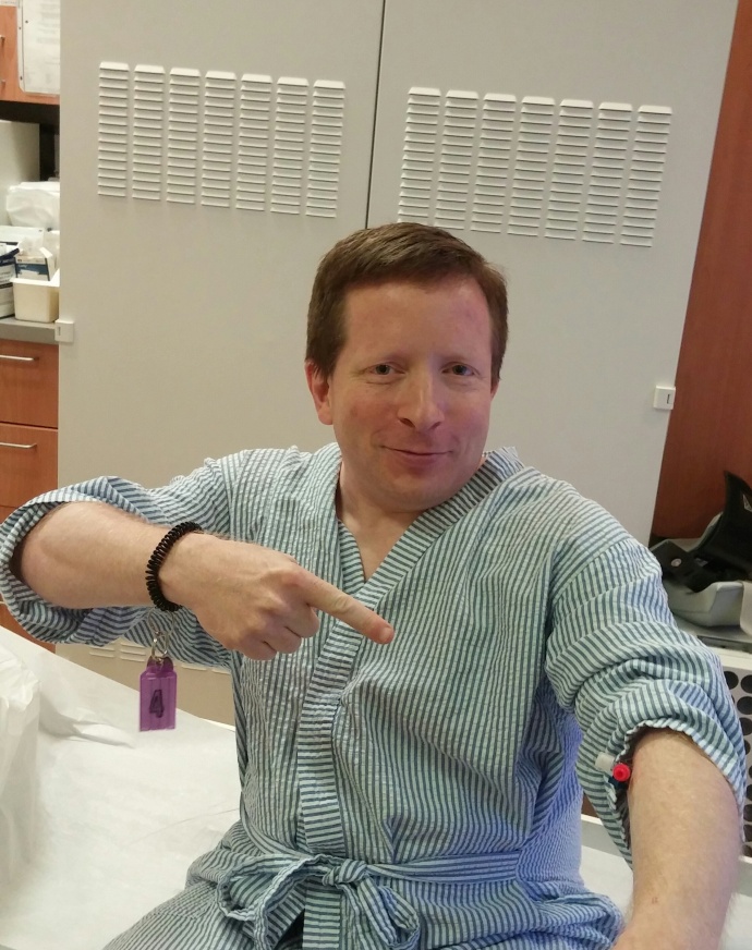 Here I am with the IV tube in my arm immediately after the completion of the CT-scan.
