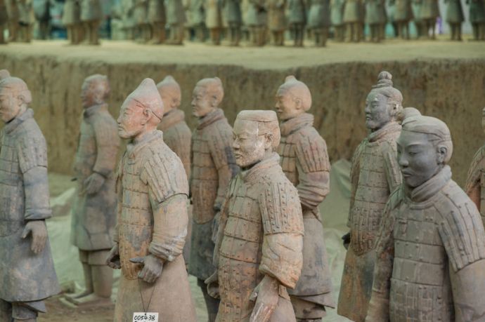 Stock photo of a portion of the army of terracotta warriors in Xi'an, China. Buried in a gigantic pit in the third century B.C., they were found in 1974.