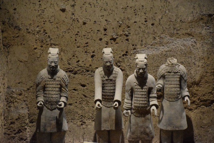 Detail of four of the warriors in the preceding photo, who originally held reins linking them to the horses in front of them.